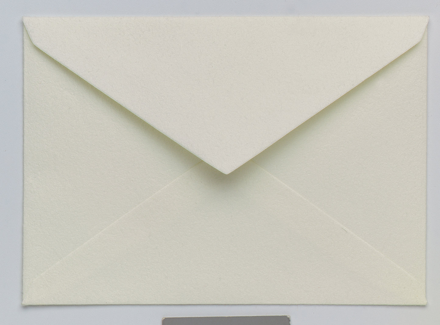 a white clock on the side of a building