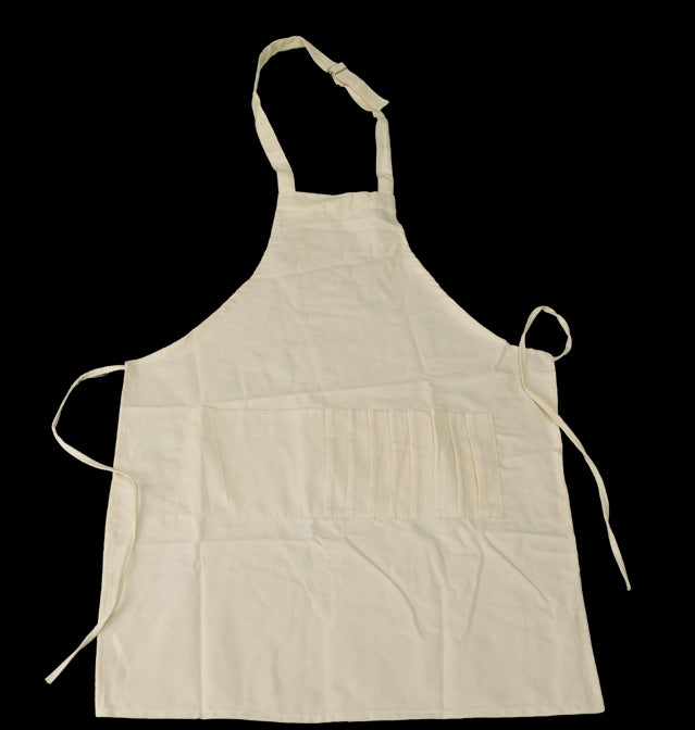 there is a white vase on a white cloth