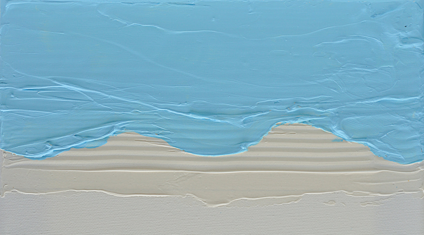 a large body of water with a sky background