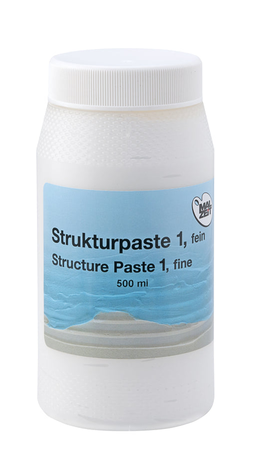 a bottle of wine sitting next to a bottle