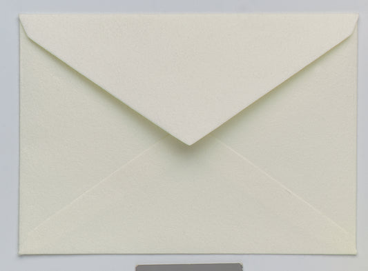 a white clock on the side of a building