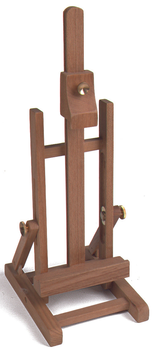 a wooden chair sitting in front of a clock tower